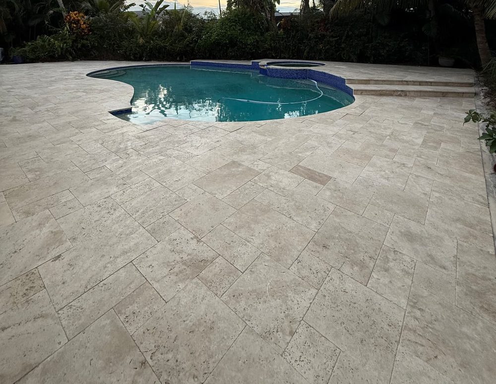 Finished pool deck after cleaning, joint sand, and sealing. finished
