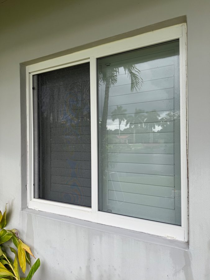 Sliding window — algae and grime removed from the glass, frame, track, and exterior sill. after