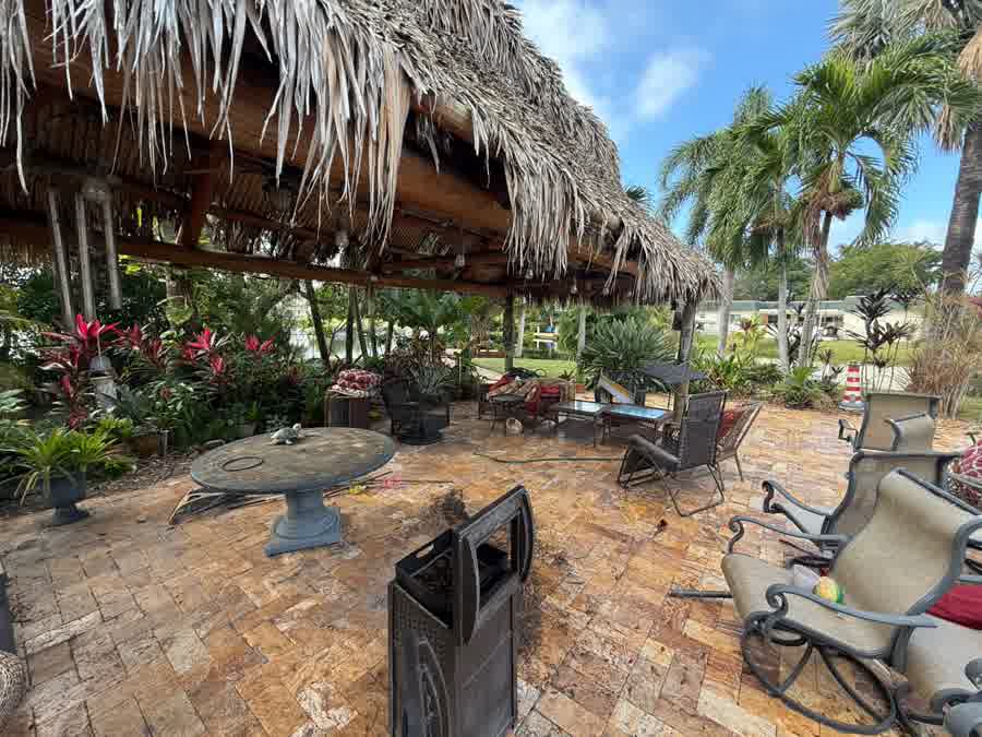 Paver patio — dirt and organic buildup cleaned out of the herringbone surface. before